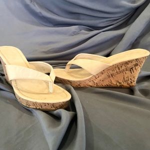 Cream colored wedge sandals